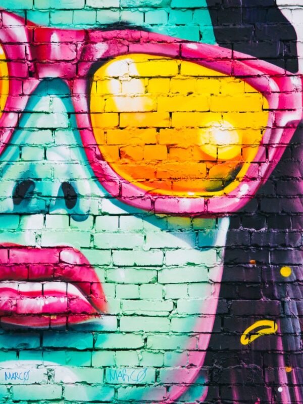 Mural of woman’s neon face